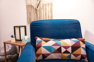 A comfortable chair is inside a Counseling office.